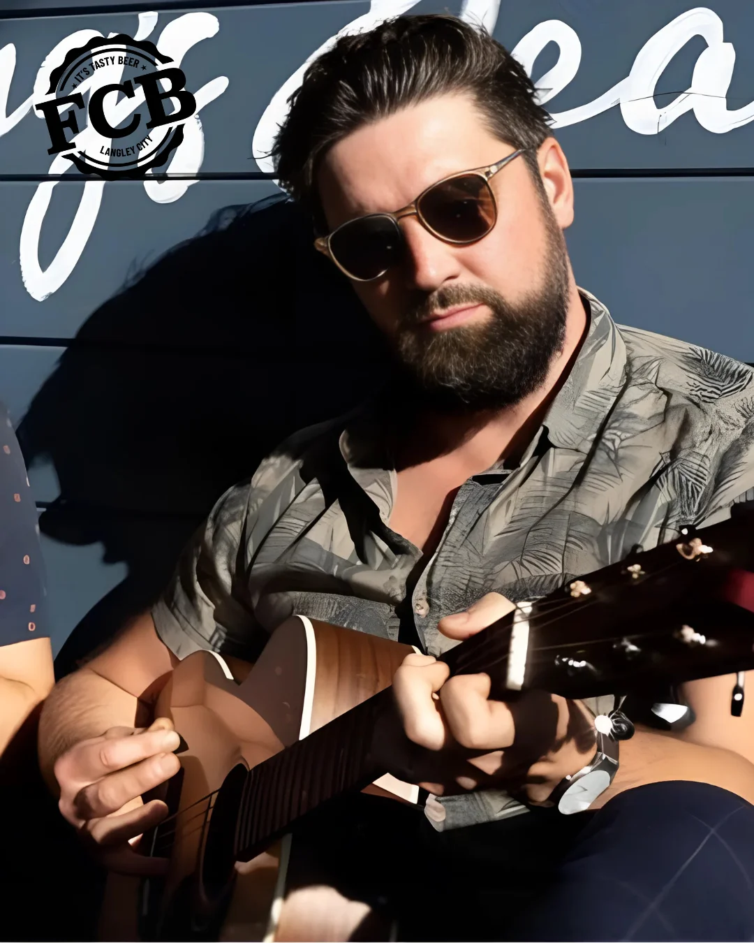 man playing a guitar