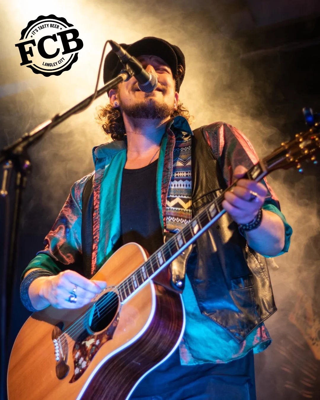 musican performing with guitar